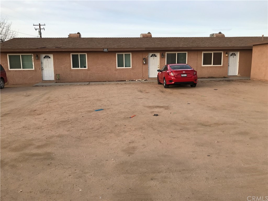 a front view of a house with yard