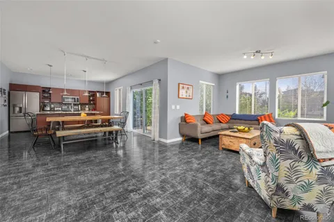 a living room with furniture and a table