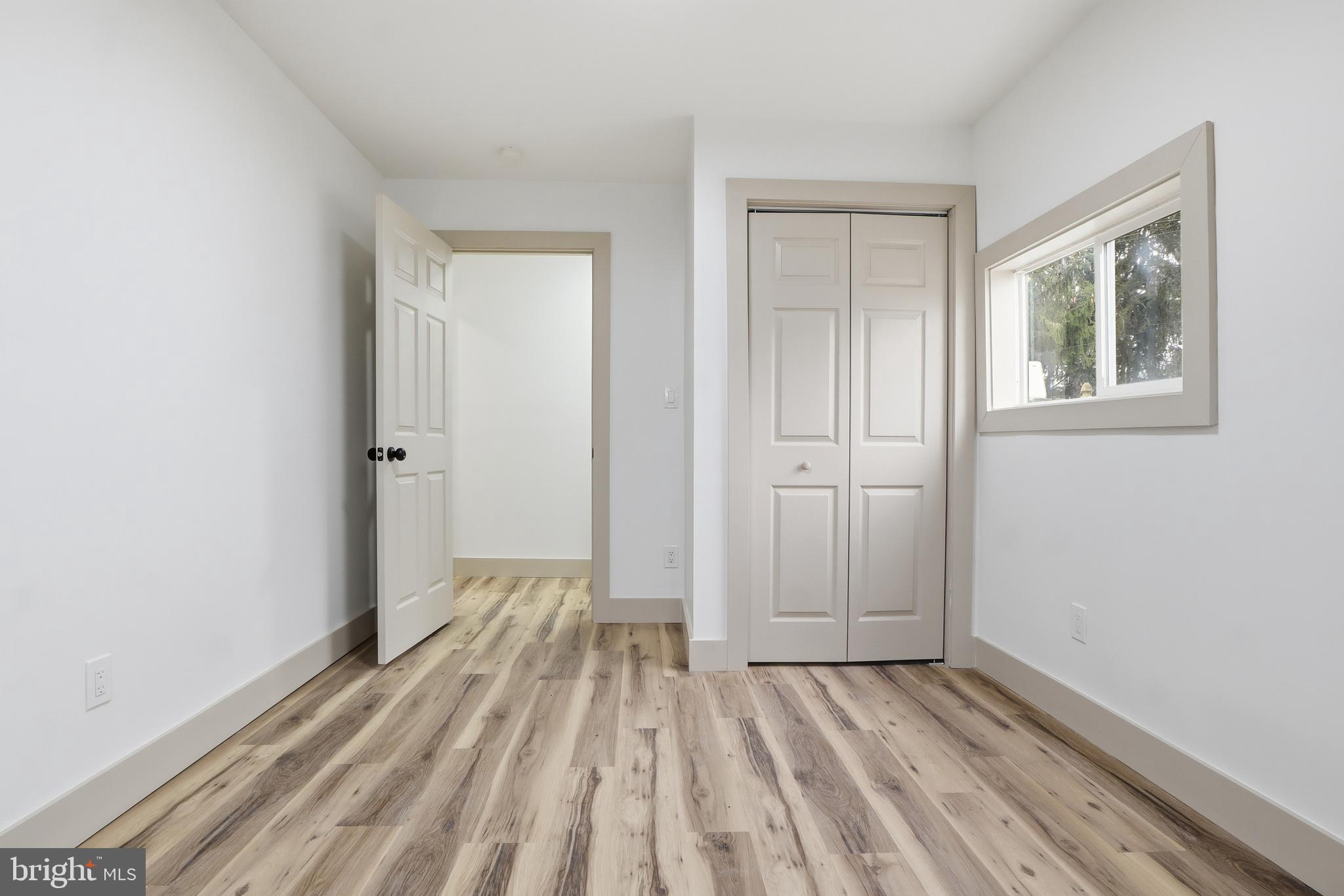 1512 Continental Road York, PA 17404 - Photo 13 of 23 a view of a room with wooden floor and windows