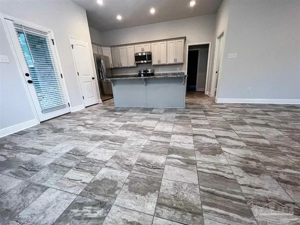 a view of kitchen and sink