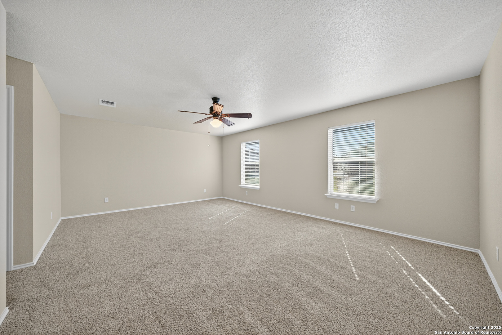 9619 Copper Spring Converse, TX 78109 - Photo 20 of 31 a view of an empty room with a window