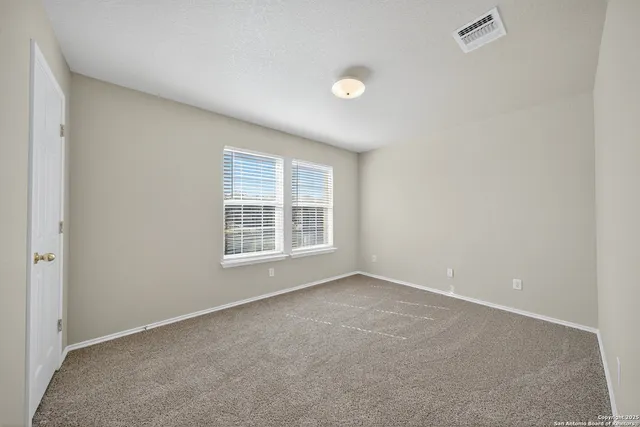 an empty room with a window