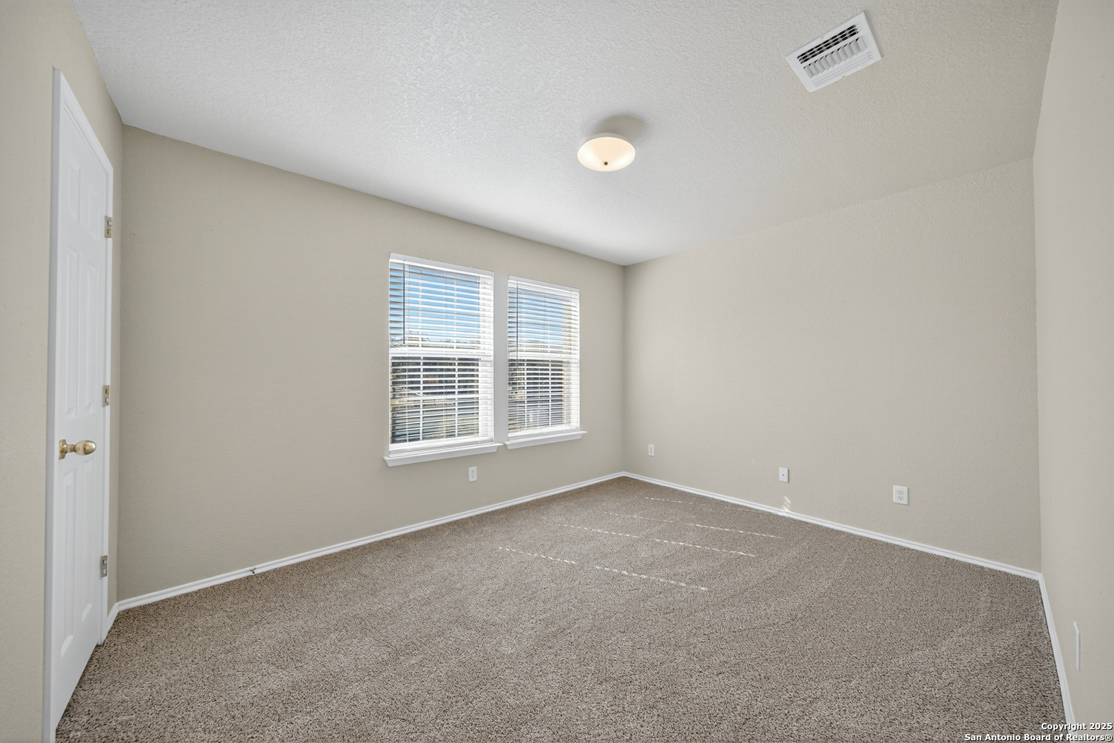 9619 Copper Spring Converse, TX 78109 - Photo 24 of 31 an empty room with a window