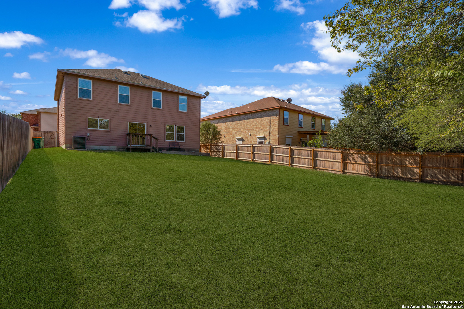 9619 Copper Spring Converse, TX 78109 - Photo 28 of 31 a view of a house with a yard