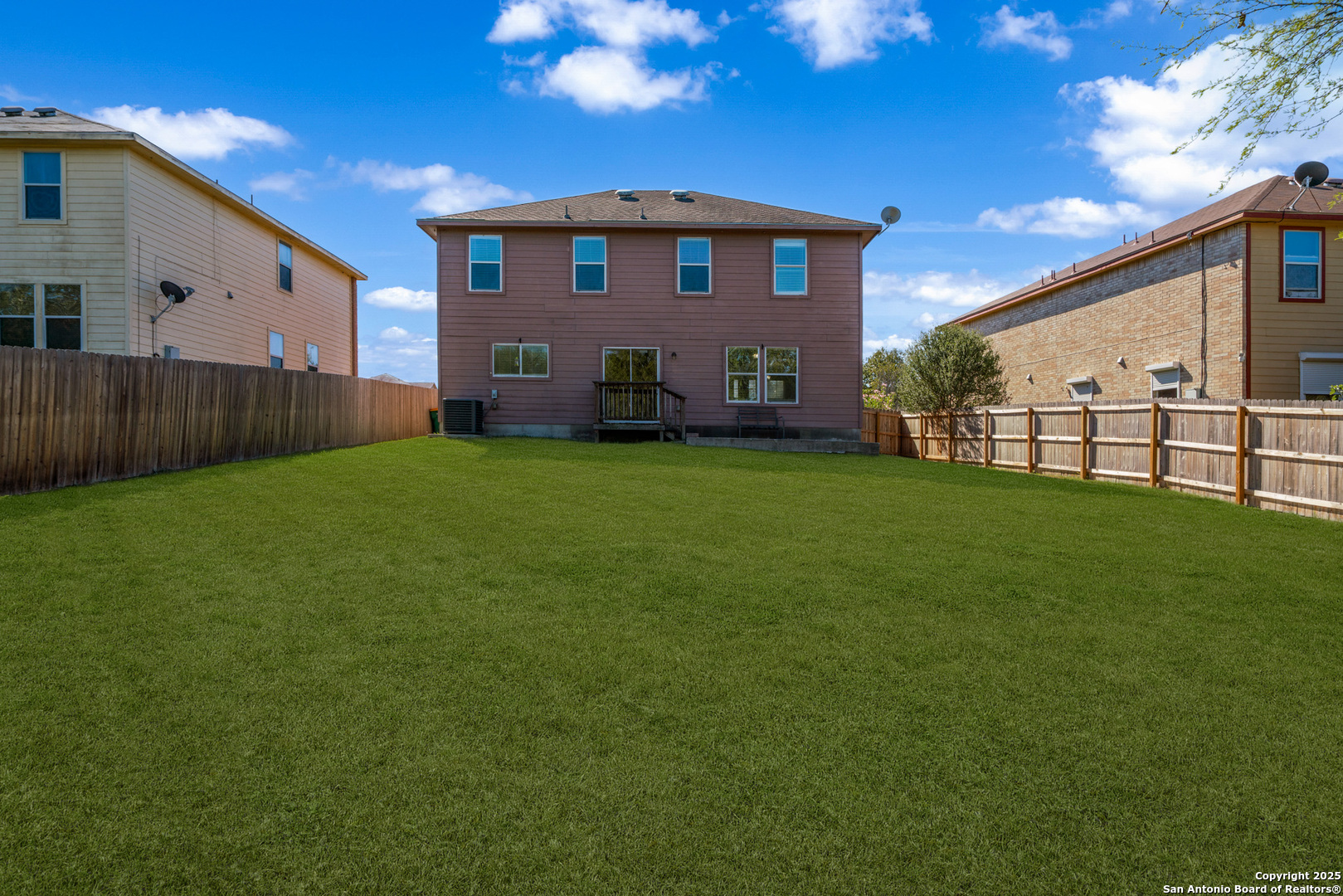 9619 Copper Spring Converse, TX 78109 - Photo 29 of 31 a view of a house with a yard