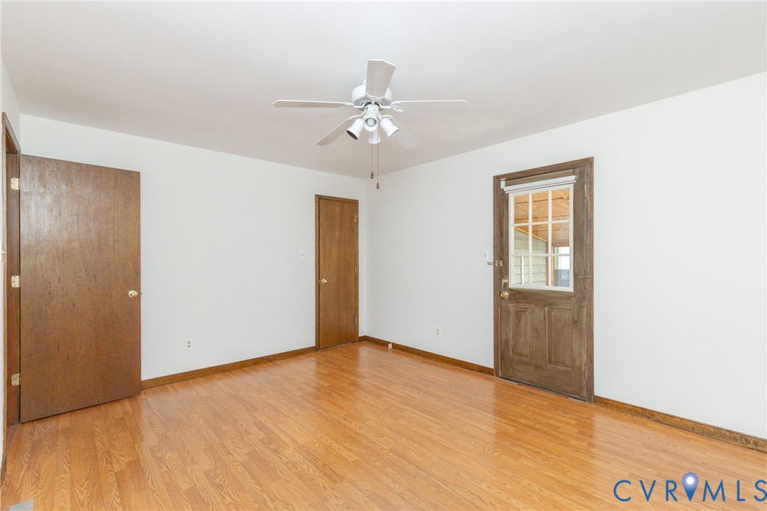 617 Rebel Ridge Road Colonial Heights, VA 23834 - Photo 26 of 49 wooden floor in an empty room with a window