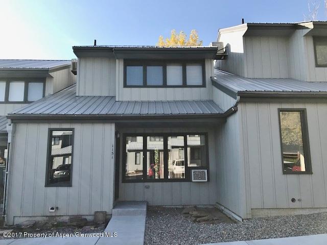 1151 Park Avenue Rifle, CO 81650 - Photo 1 of 9 a front view of a house