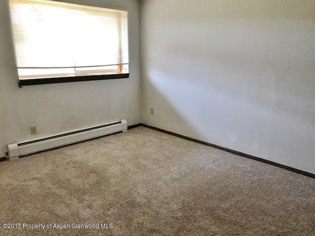 1151 Park Avenue Rifle, CO 81650 - Photo 5 of 9 a view of a window in an empty room