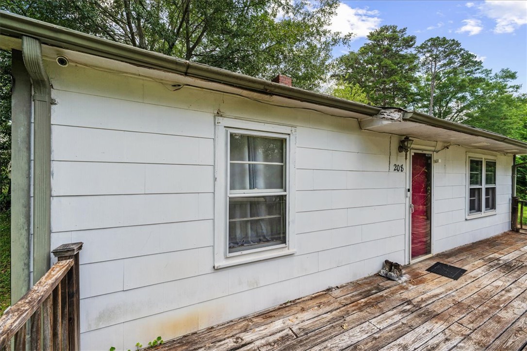 208 Holleman Street Seneca, SC 29678 - Photo 1 of 27 This charming home offers a cozy retreat with a welcoming porch and inviting facade.