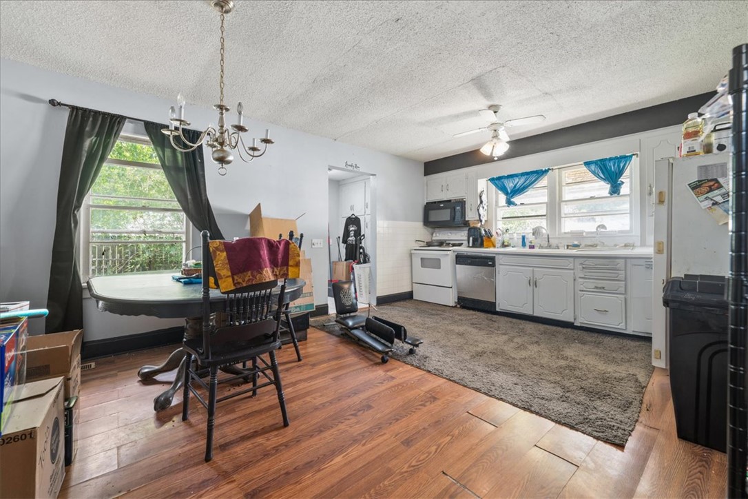 208 Holleman Street Seneca, SC 29678 - Photo 13 of 27 This spacious kitchen offers ample room for culinary endeavors and gatherings.