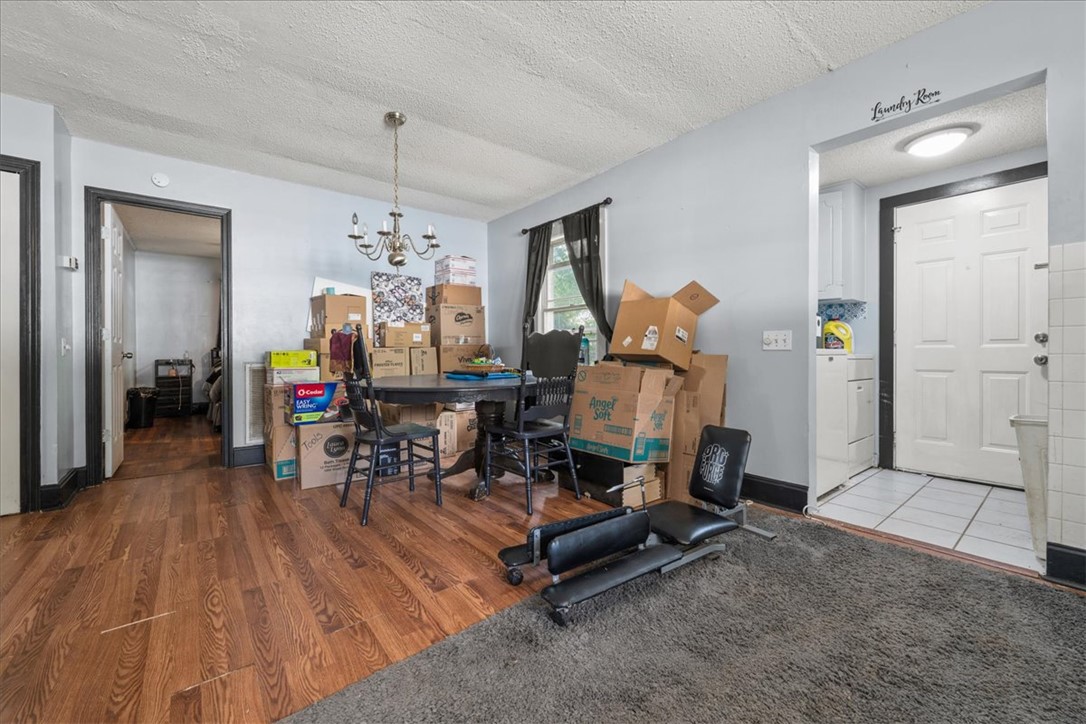 208 Holleman Street Seneca, SC 29678 - Photo 14 of 27 This versatile space features durable flooring, offering comfort and style.