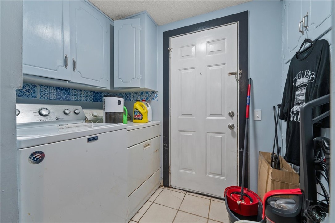 208 Holleman Street Seneca, SC 29678 - Photo 17 of 27 Functional laundry space with convenient appliances and easy access to outdoor areas.