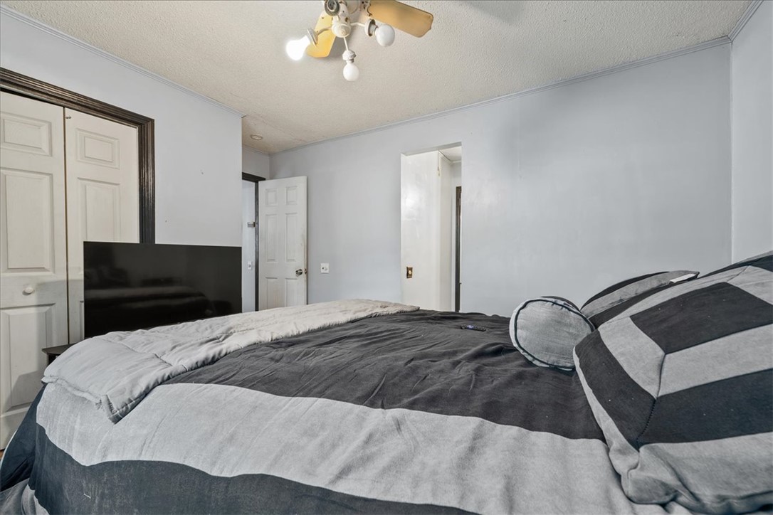 208 Holleman Street Seneca, SC 29678 - Photo 19 of 27 This cozy room offers a comfortable and inviting atmosphere, perfect for unwinding after a long day.