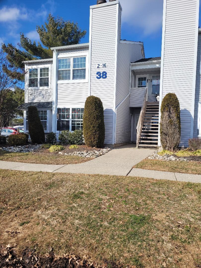 14 Meadow Ridge Road, Unit 14 Smithville, NJ 08205 - Photo 1 of 8 a view of backyard with seating space
