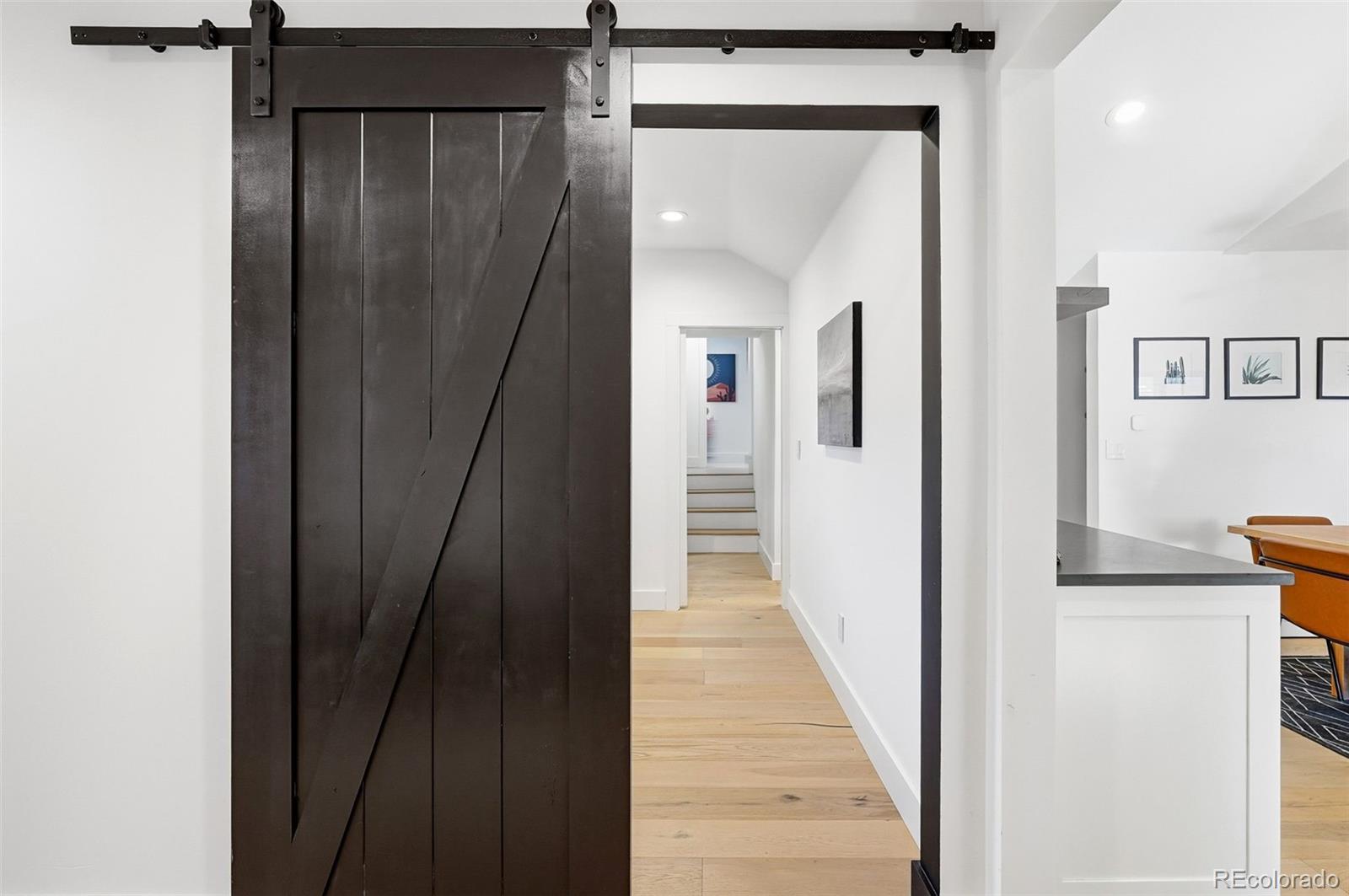 6940 Independence Street Arvada, CO 80004 - Photo 13 of 32 a view of a hallway with a elevator