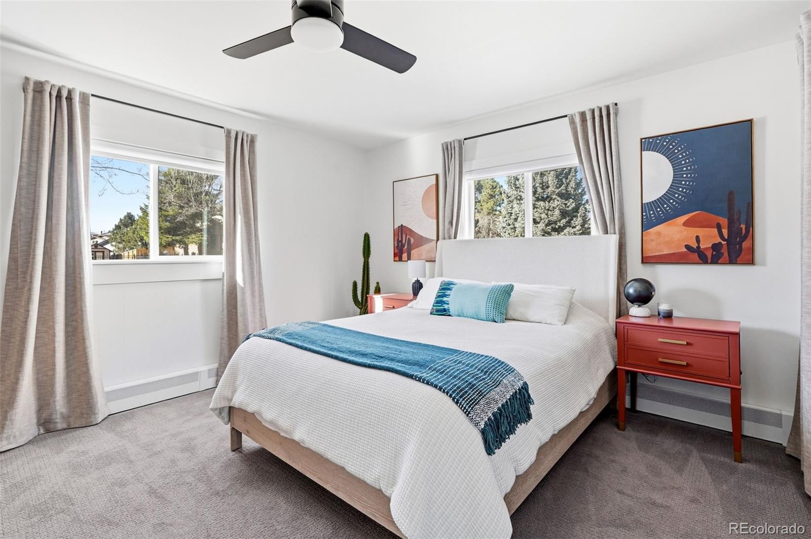 6940 Independence Street Arvada, CO 80004 - Photo 17 of 32 a bedroom with a bed and window