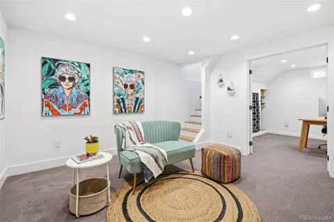 a view of a workspace with furniture