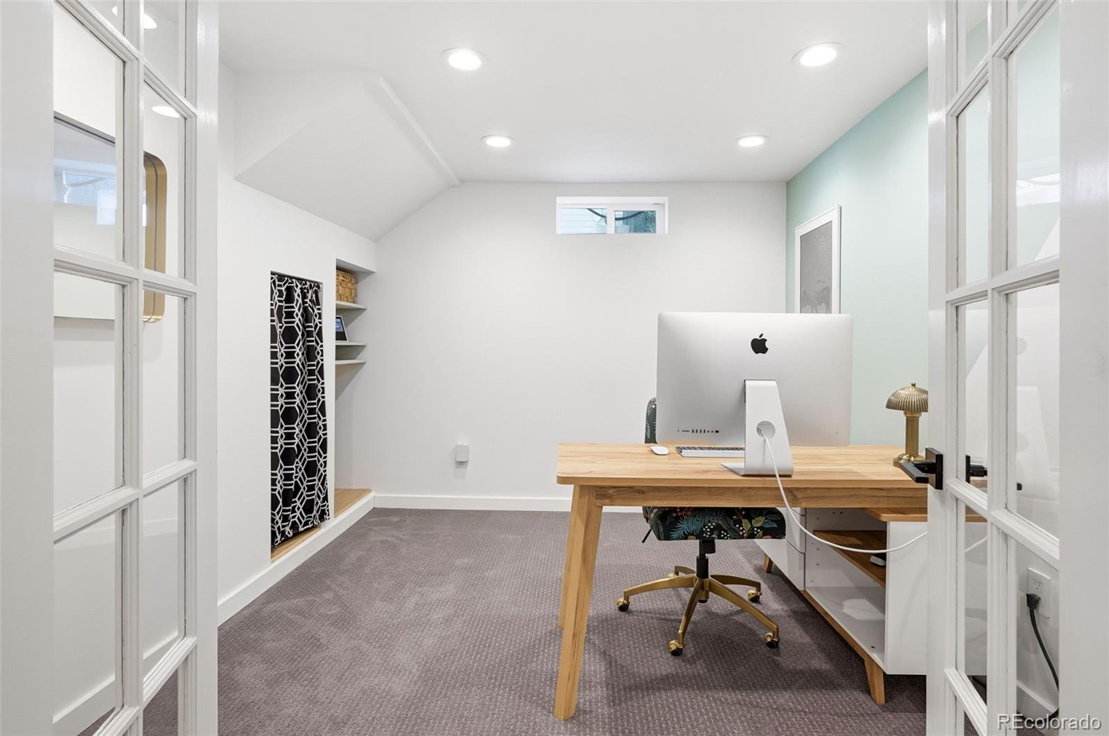 6940 Independence Street Arvada, CO 80004 - Photo 22 of 32 a view of a workspace with furniture