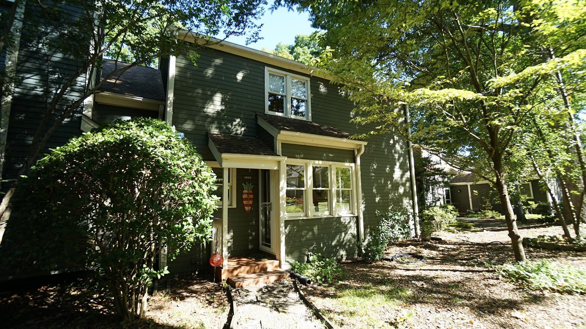 1809 Falls Church Road Raleigh, NC 27609 - Photo 1 of 56 a front view of a house with garden