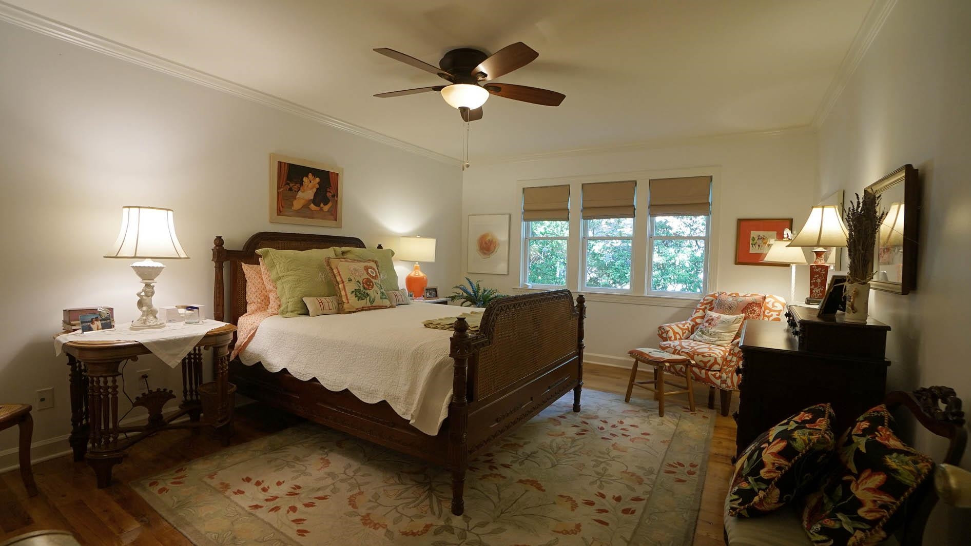 1809 Falls Church Road Raleigh, NC 27609 - Photo 16 of 56 a bedroom with a bed and wooden floor