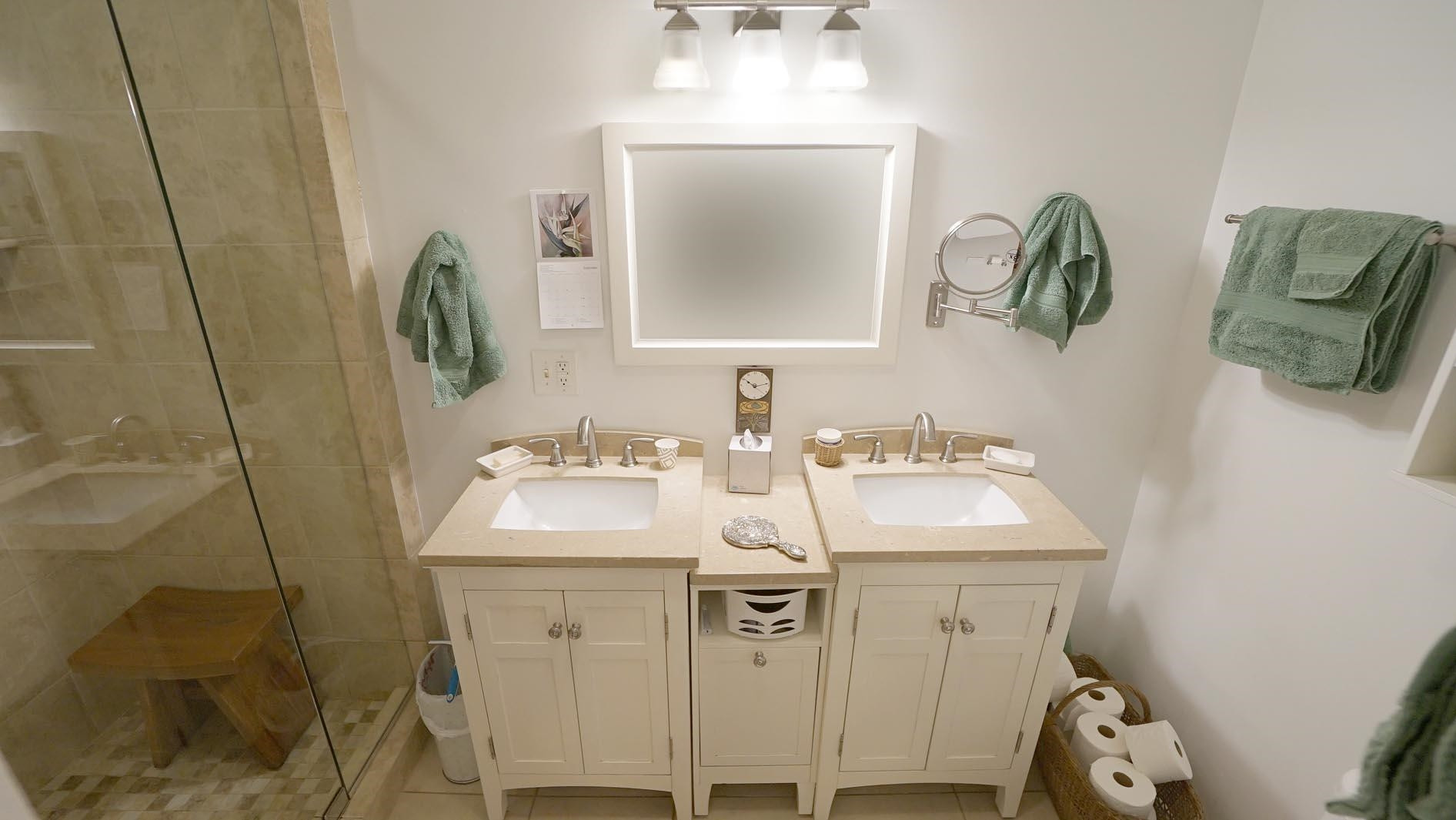 1809 Falls Church Road Raleigh, NC 27609 - Photo 20 of 56 a bathroom with a sink and a mirror