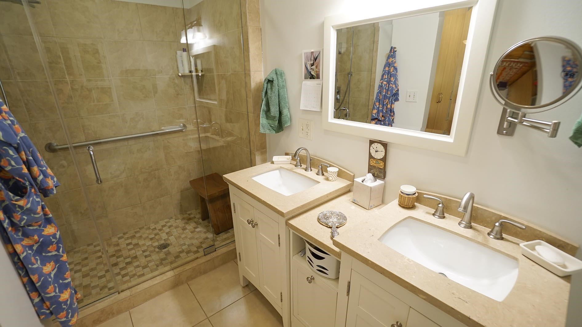 1809 Falls Church Road Raleigh, NC 27609 - Photo 21 of 56 a bathroom with a sink and a mirror