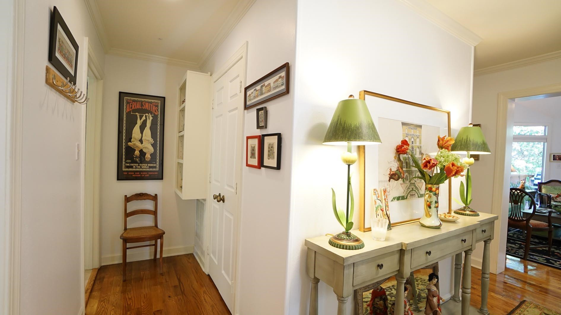 1809 Falls Church Road Raleigh, NC 27609 - Photo 26 of 56 a view of a hallway with furniture and wooden floor