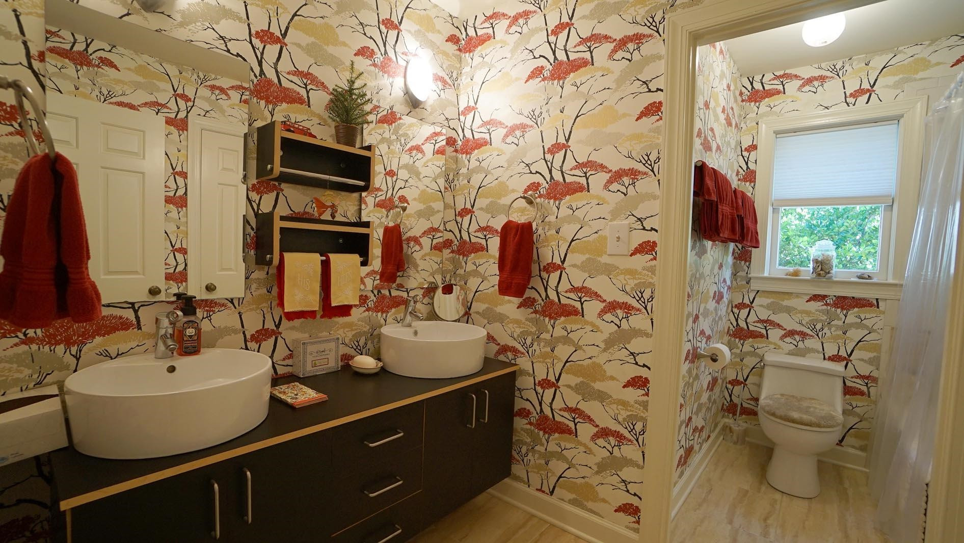 1809 Falls Church Road Raleigh, NC 27609 - Photo 37 of 56 a bathroom with a sink toilet and shower