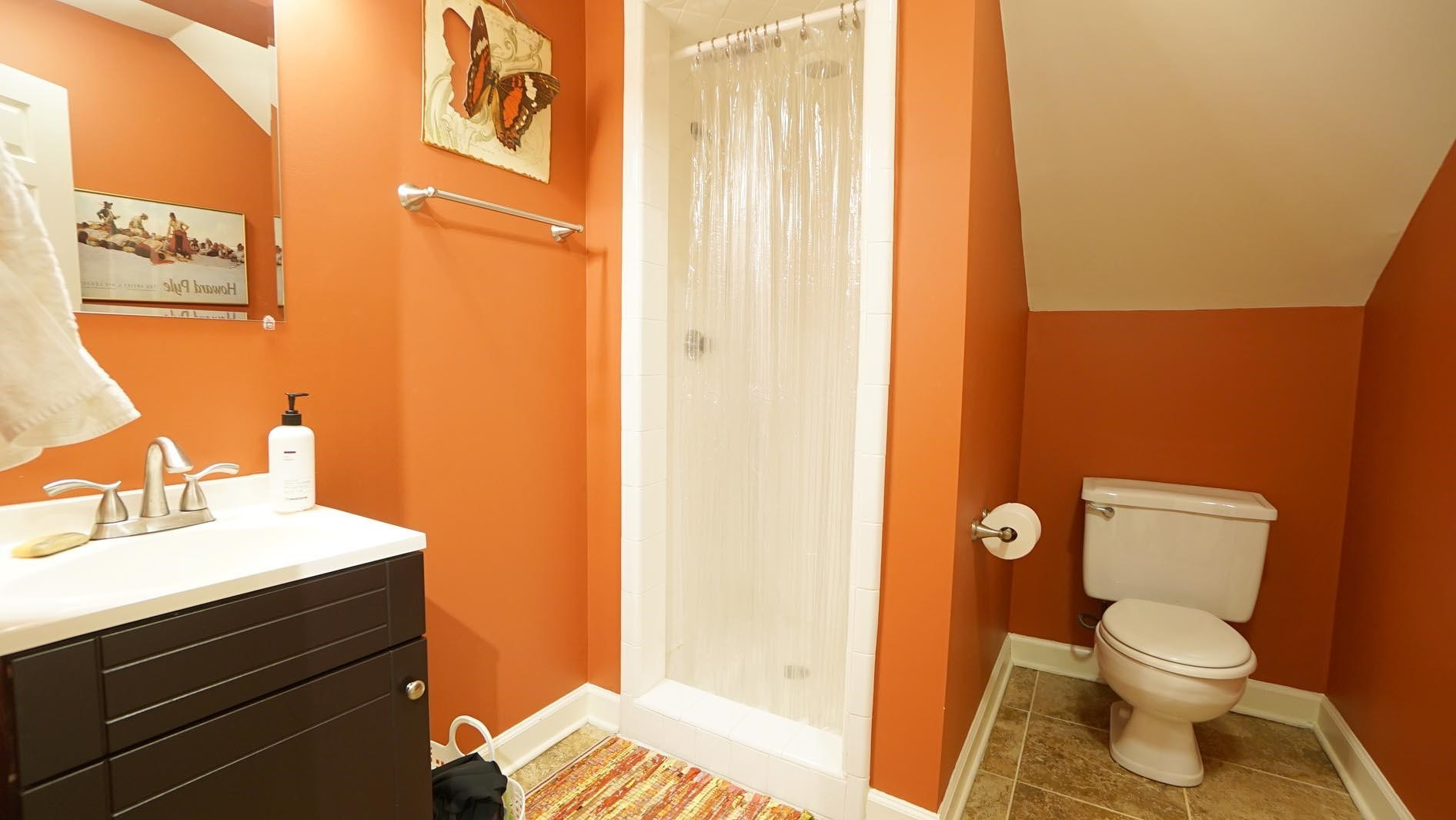 1809 Falls Church Road Raleigh, NC 27609 - Photo 42 of 56 a bathroom with a sink and a mirror