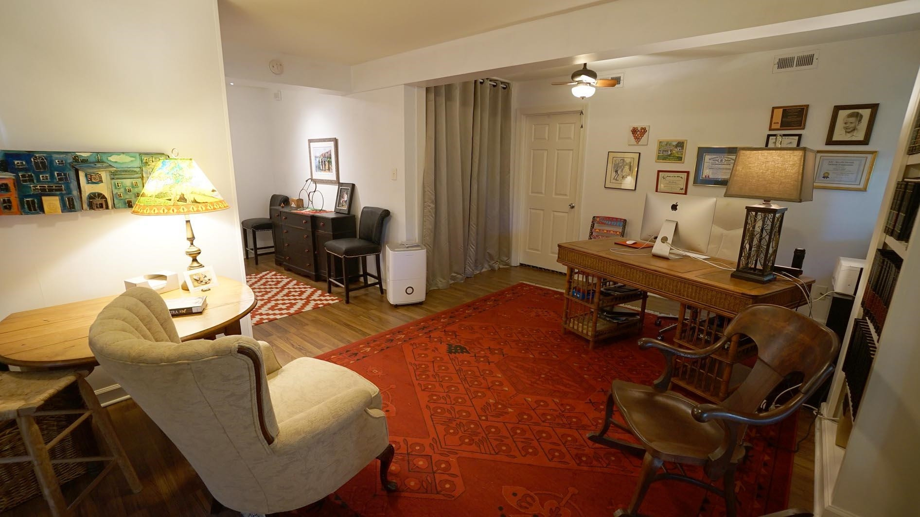 1809 Falls Church Road Raleigh, NC 27609 - Photo 46 of 56 a living room with furniture and wooden floor