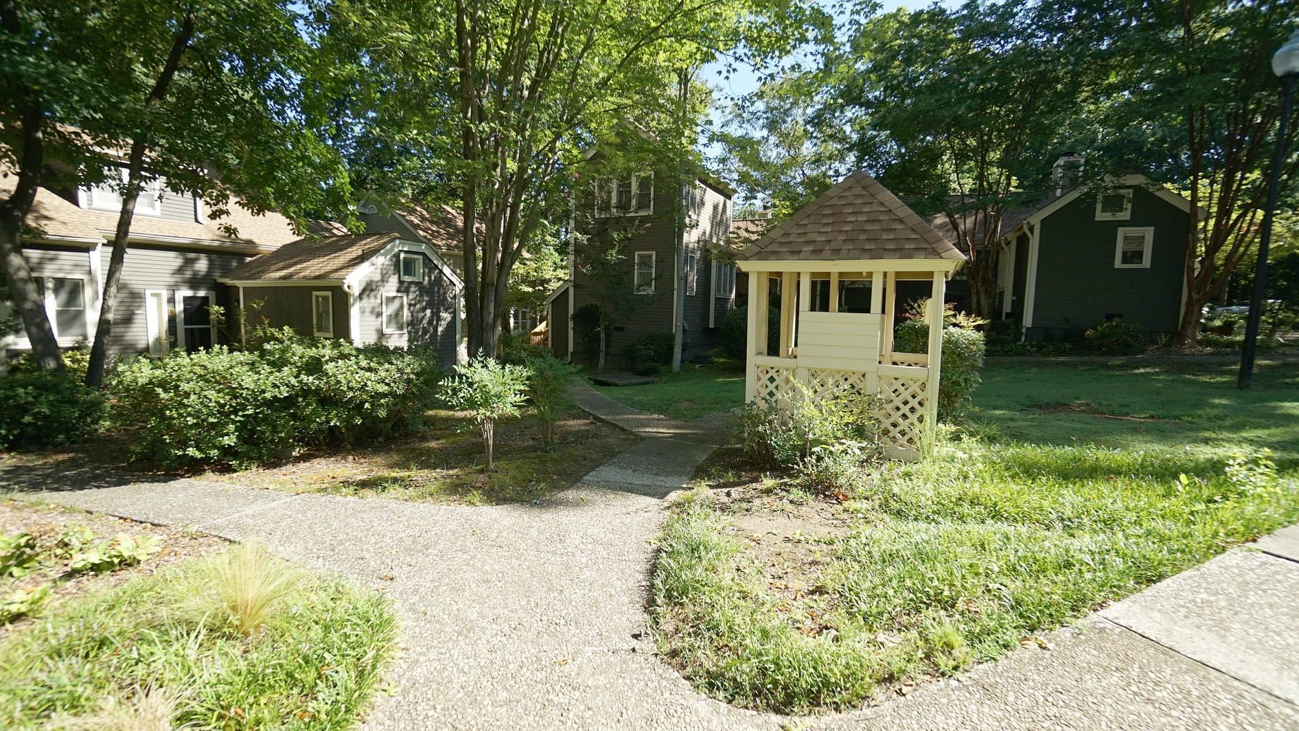 1809 Falls Church Road Raleigh, NC 27609 - Photo 53 of 56 a front view of a house with a yard