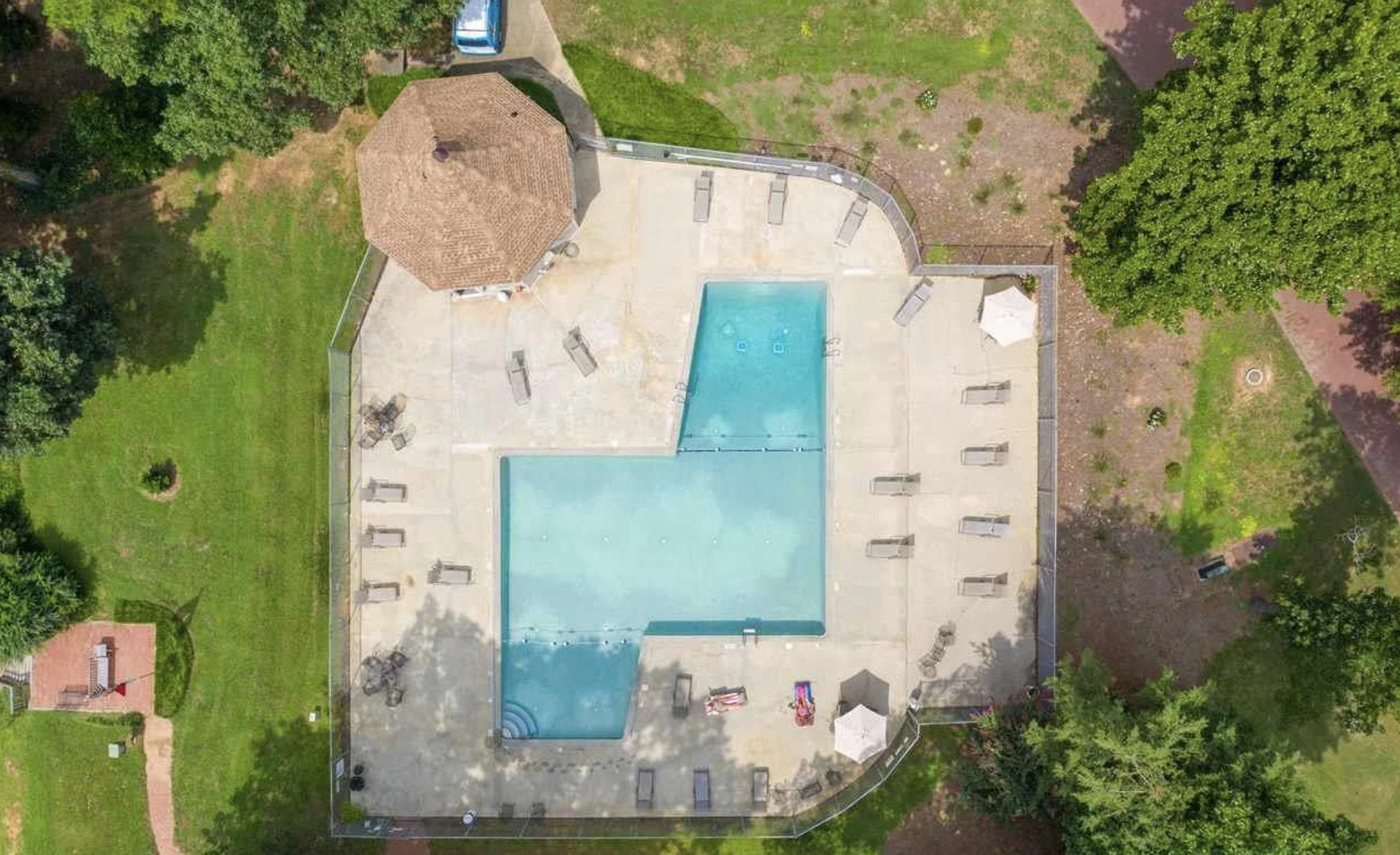 1809 Falls Church Road Raleigh, NC 27609 - Photo 56 of 56 an aerial view of a house with outdoor space and trees all around