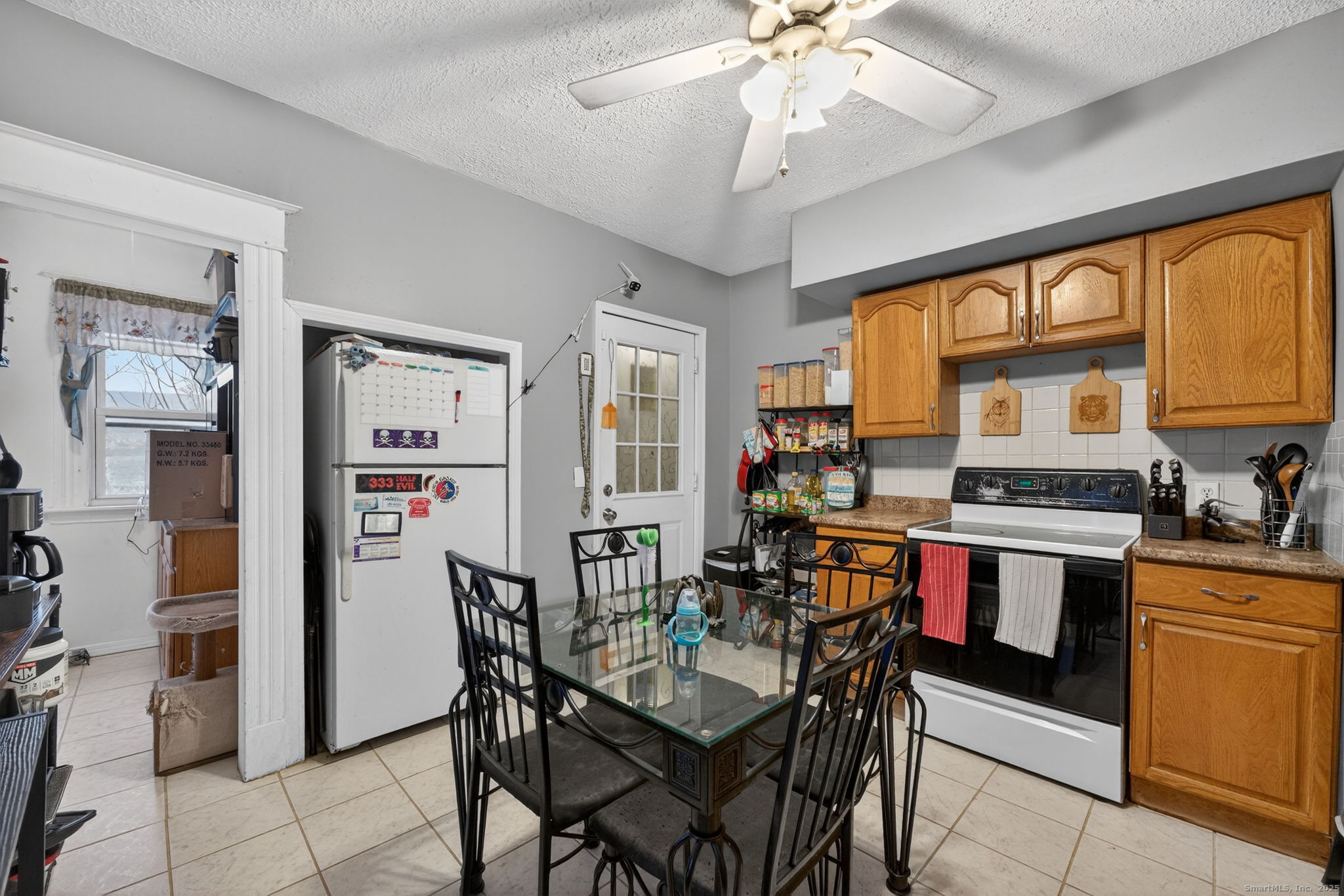 38 Center Street Bristol, CT 06010 - Photo 18 of 28 a view of a dining room with furniture window and wooden floor