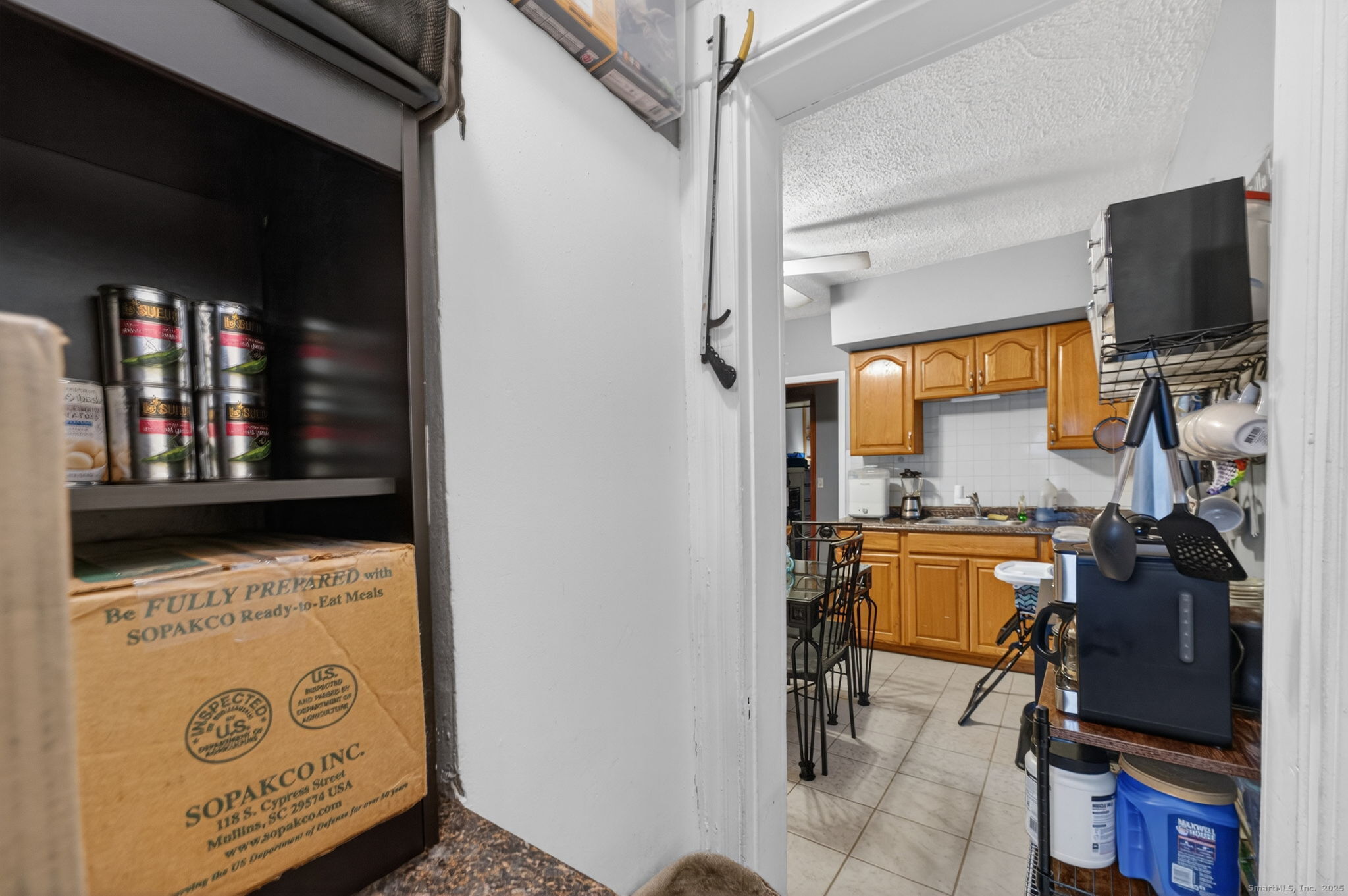 38 Center Street Bristol, CT 06010 - Photo 20 of 28 a view of a living room with a flat screen tv