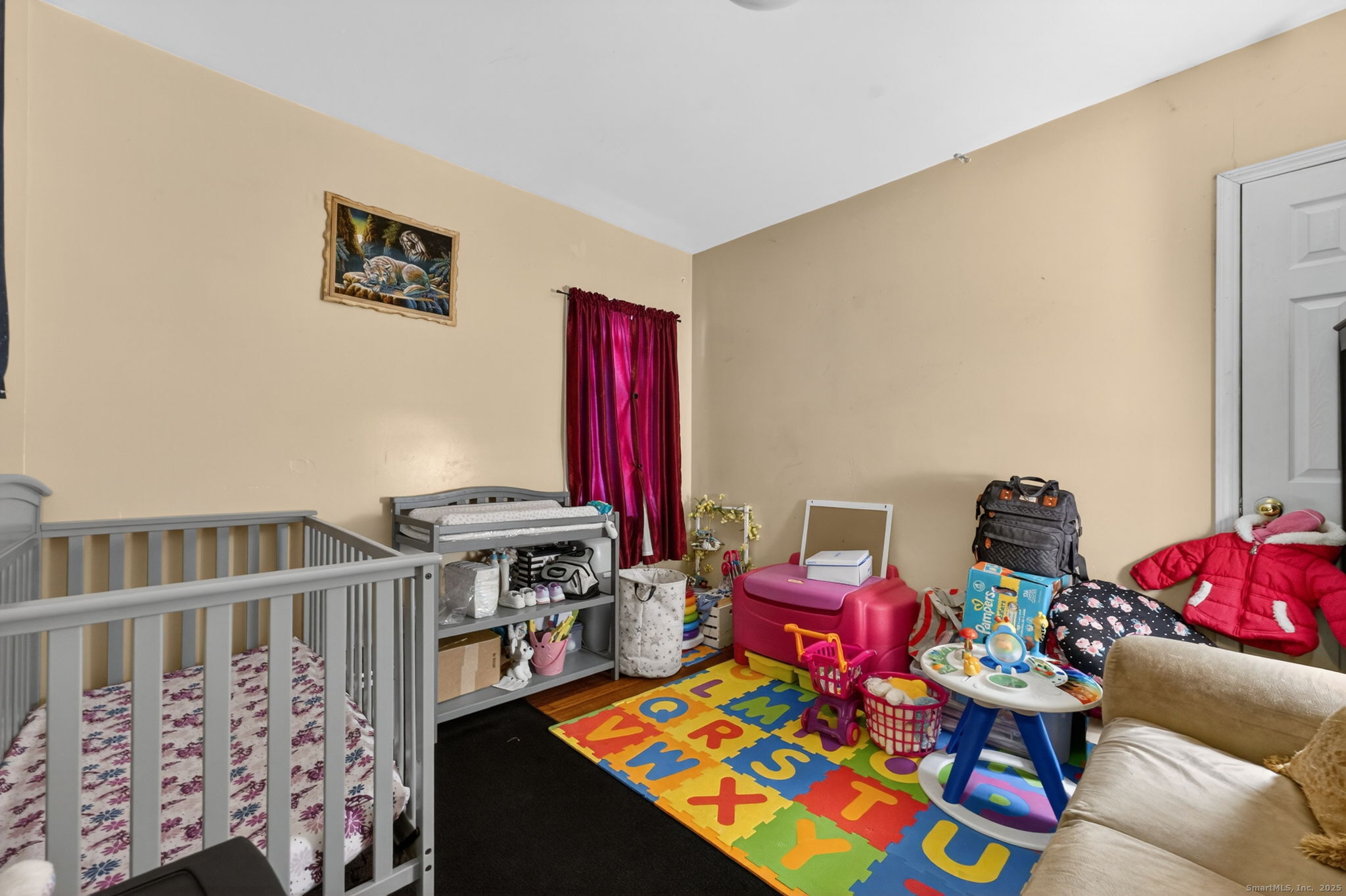 38 Center Street Bristol, CT 06010 - Photo 24 of 28 a living room with furniture and a couch
