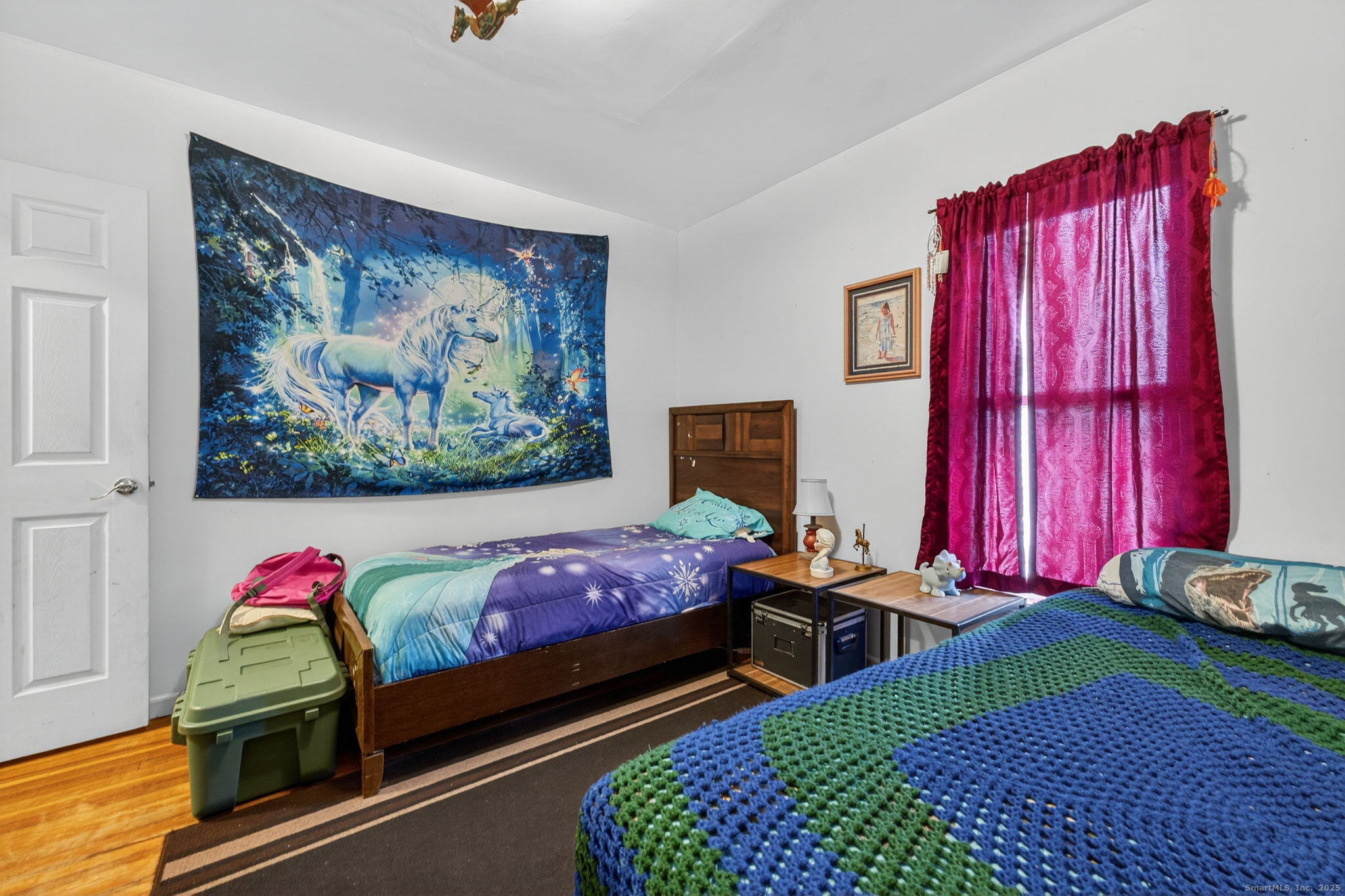 38 Center Street Bristol, CT 06010 - Photo 27 of 28 a bedroom with furniture and a bed