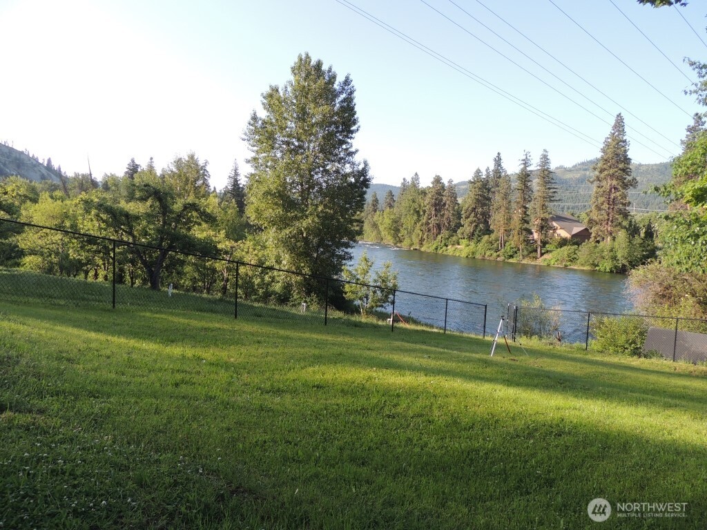 9291 Pakascwa Road Peshastin, WA 98847 - Photo 36 of 38 a view of a field of grass and trees
