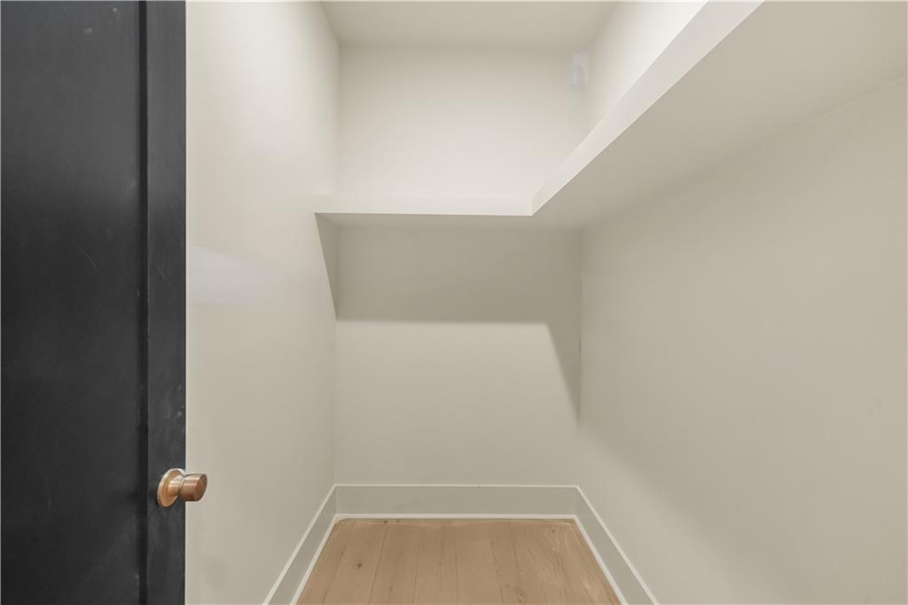 3214 Osborne Road Northeast Atlanta, GA 30319 - Photo 18 of 41 close up of hanging light and toilet