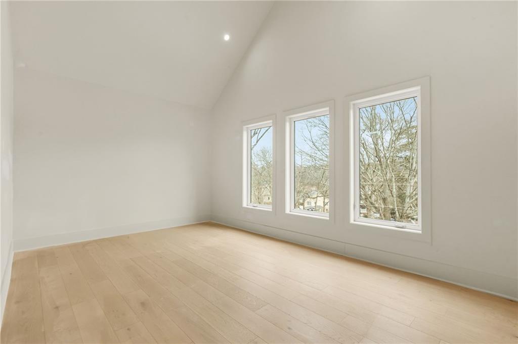 3214 Osborne Road Northeast Atlanta, GA 30319 - Photo 28 of 41 an empty room with windows