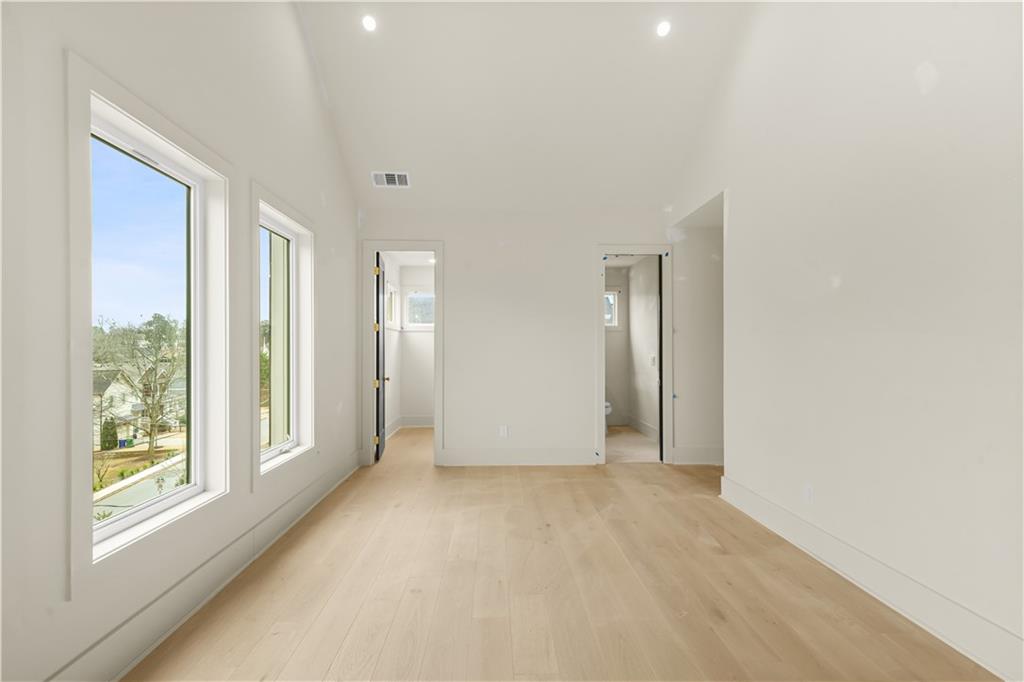 3214 Osborne Road Northeast Atlanta, GA 30319 - Photo 29 of 41 a view of an empty room with glass door