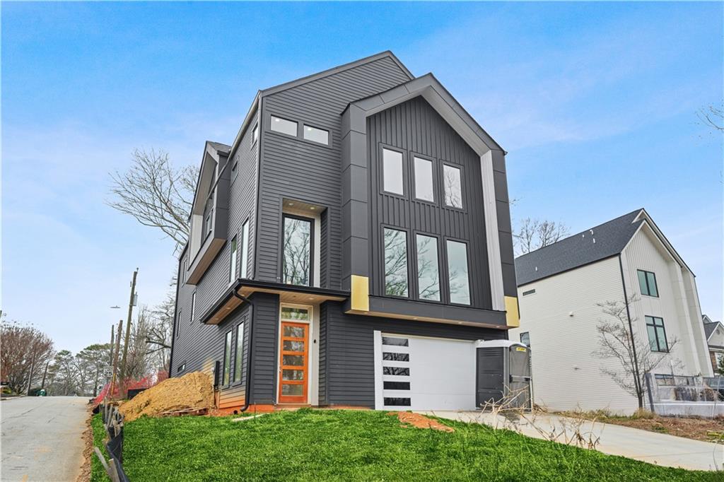 3214 Osborne Road Northeast Atlanta, GA 30319 - Photo 41 of 41 front view of a house with a yard
