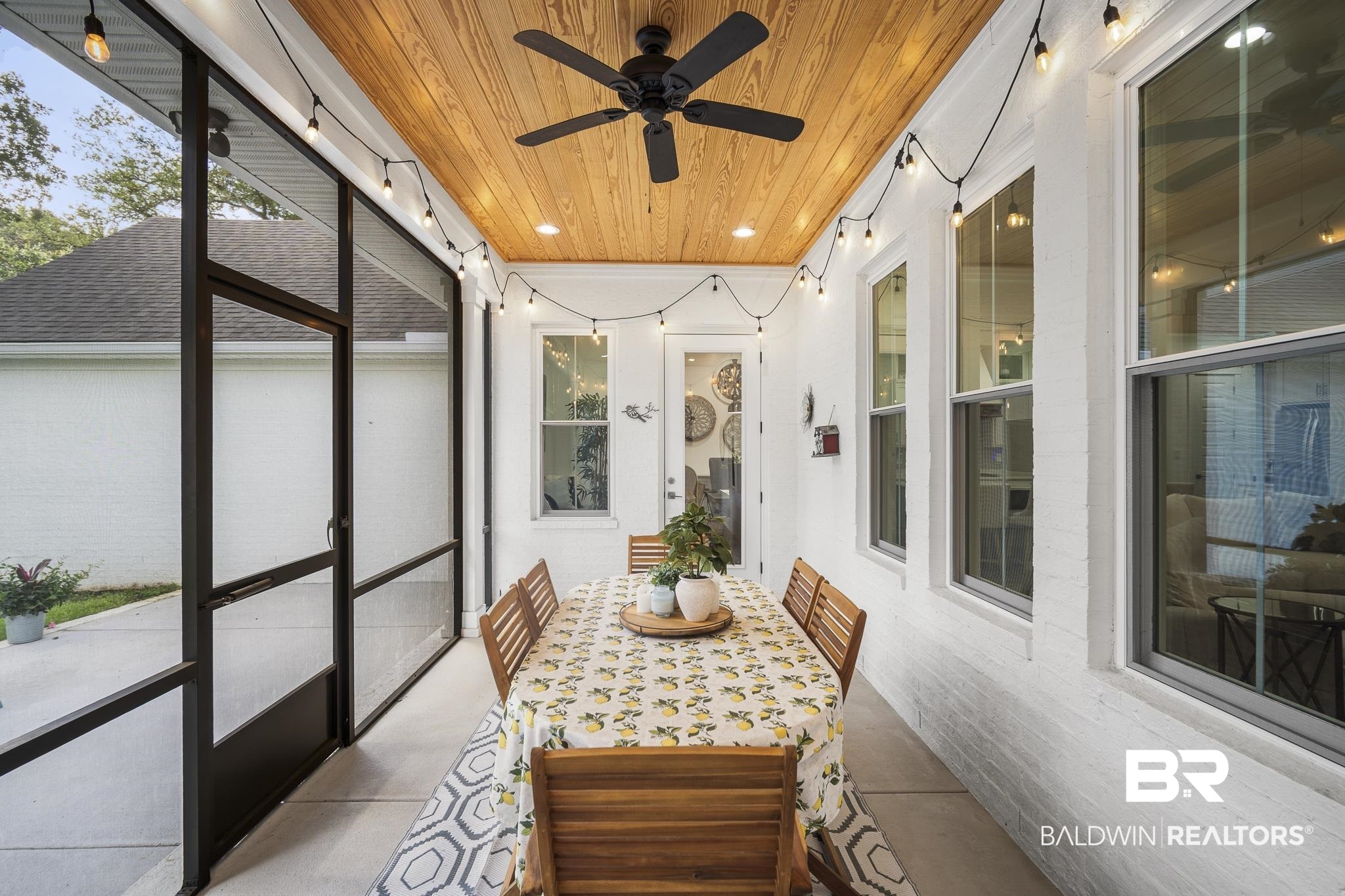 21702 Pillars Street Fairhope, AL 36532 - Photo 34 of 54 Screened patio featuring a wood-finish ceiling, recessed lighting, and a black ceiling fan