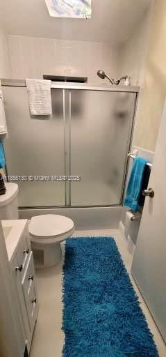14447 Southwest 152nd Terrace, Unit BACKDOOR Miami, FL 33177 - Photo 5 of 10 a bathroom with a toilet and a shower
