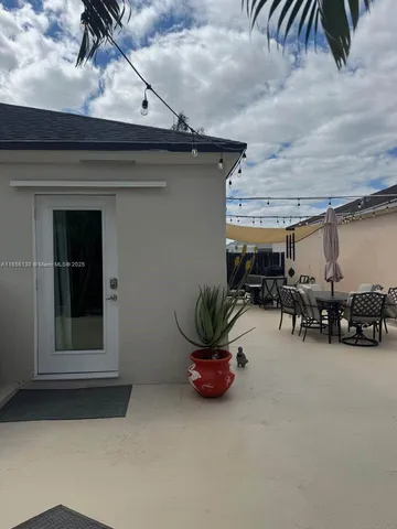 a view of a garage with cars