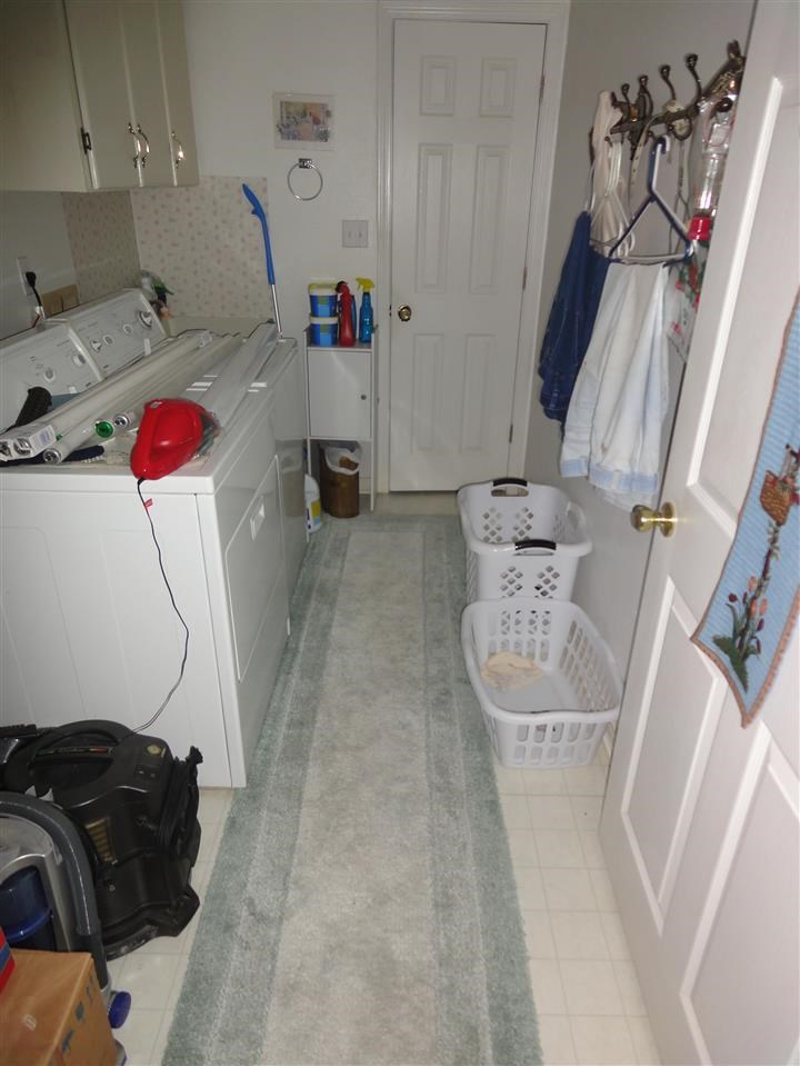 3901 Schifko Road Cantonment, FL 32533 - Photo 21 of 28 In door utility with sink and built in iron board