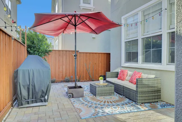 an outdoor space with patio furniture