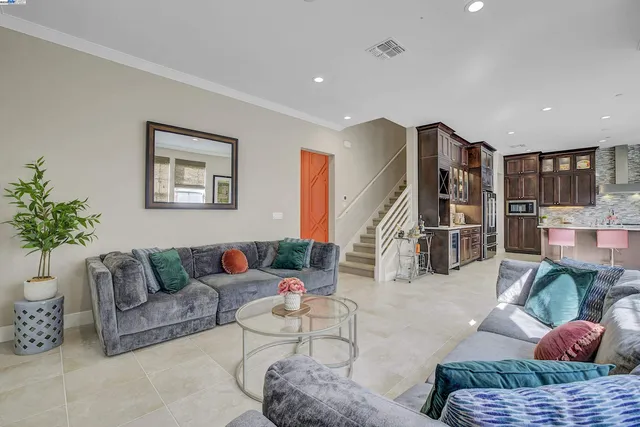 a living room with furniture and a couch