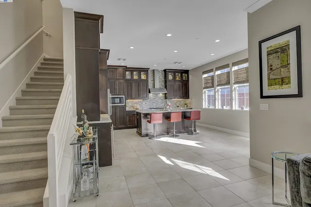 a view of livingroom with furniture and workspace