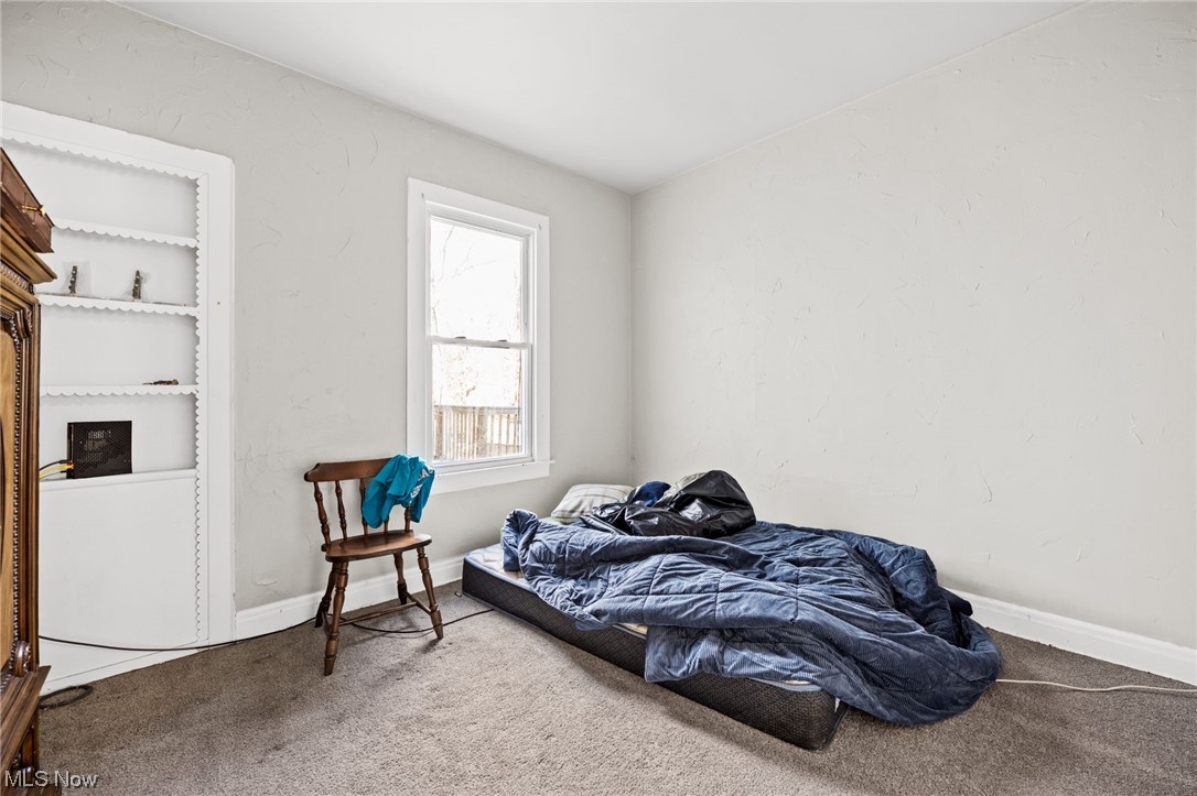 4661 Liberty Road Cleveland, OH 44121 - Photo 11 of 42 Bedroom with light carpet