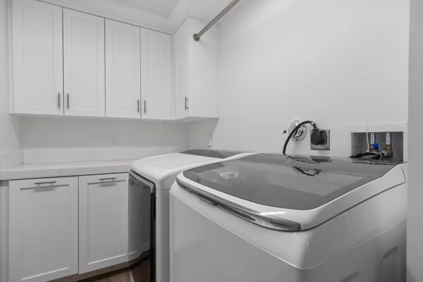 a view of swimming pool with outdoor seating and plants